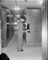 Davis Press - man in interior of bank